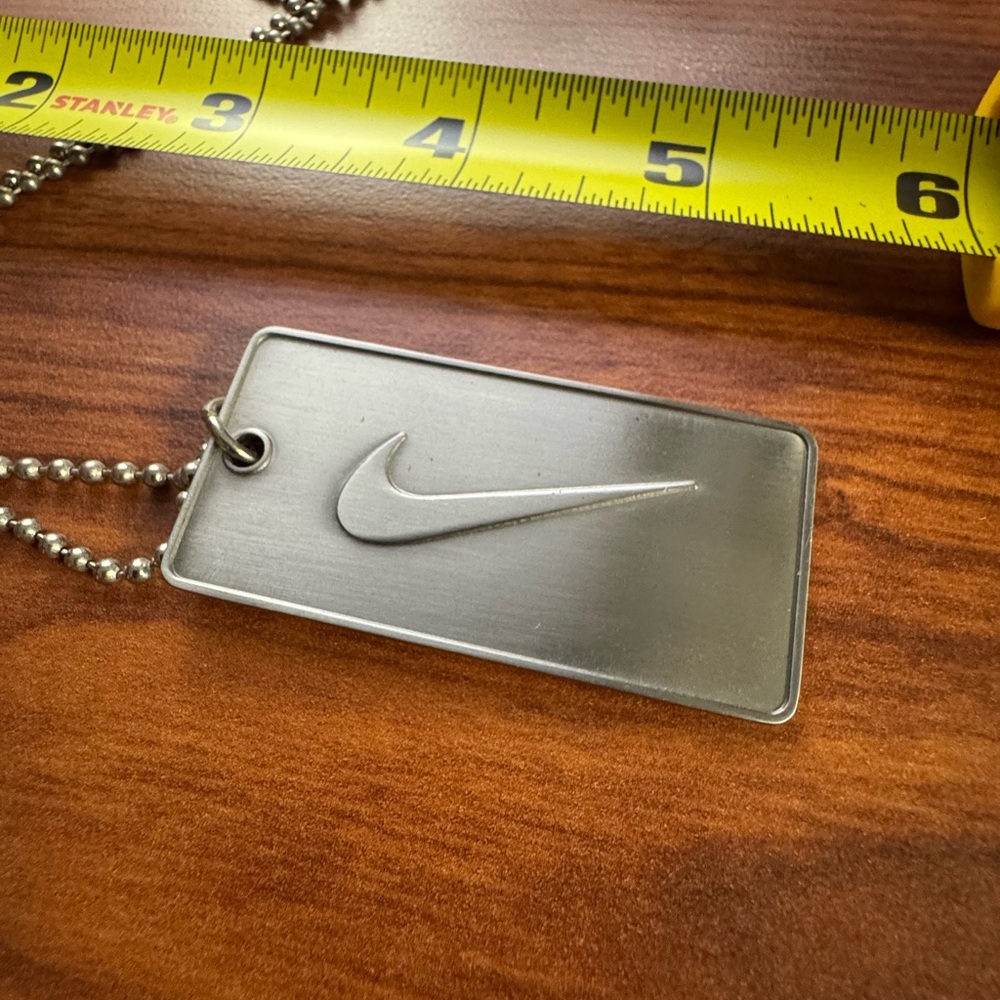 Nike Silver Metal Swoosh Dog Tag Necklace